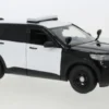 Ford Police Interceptor Utility, schwarz/weiss, 2022, 1:24, Motormax
