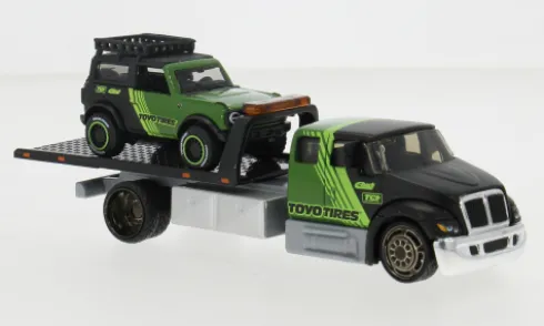 International Durastar Flatbed, schwarz/grün, 2021, 1:64, Maisto