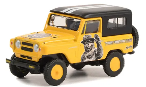 Nissan Patrol, gelb/schwarz, 1965, Smokey Bear, 1:64, Greenlight