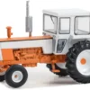 - Tractor with enclosed Cab, orange/weiss, 1973, 1:64, Greenlight